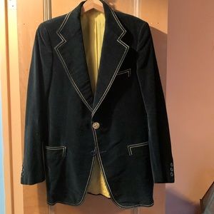 Vintage custom made black velvet men’s jacket with yellow silk lining.